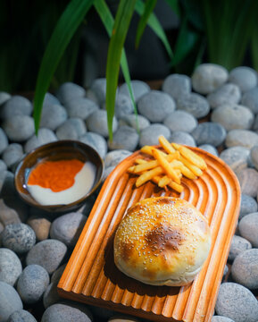 Traditional Turkish cuisine, pide stuffed with minced meat. Middle Eastern snack cuisine on a clay plate, cooked meat pie, cheese pastry pie