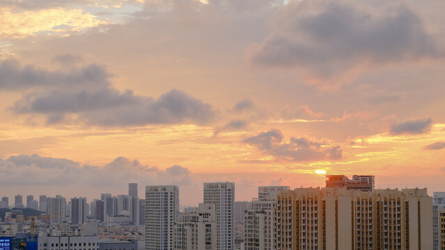 A city skyline at sunset