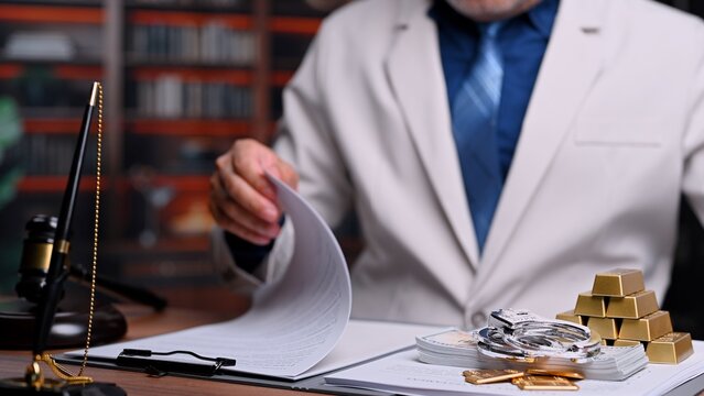 Official inspects financial corruption papers, exposing corporate corruption along bribery cases, as government corruption investigation reveals hidden bribery affecting legal justice.
