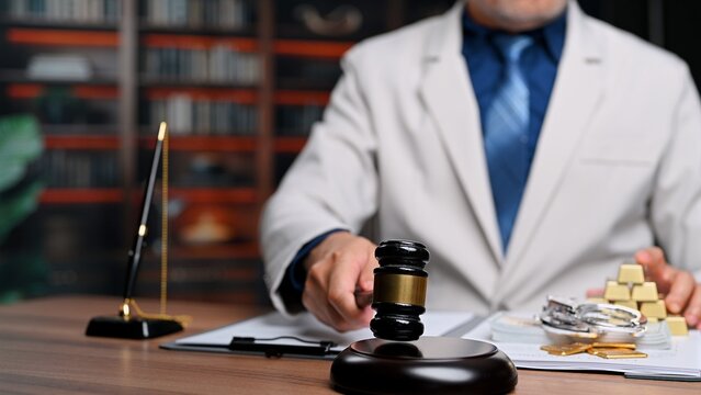 Judge handles corruption evidence, reviewing corruption cases as systemic corruption threatens court integrity, delivering justice when law demands equal justice, serving legal duties.