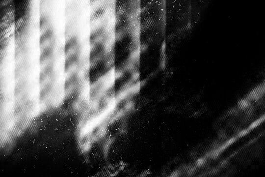 Photocopies of a black and white sheet of paper with a background or texture with grain and noise illustration