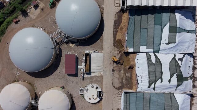 Aerial View of Tractor Loading Silage for Biomethane Production on an Italian Farm
