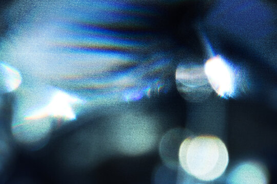 Beautiful light leak on dark background with Real lens flare.