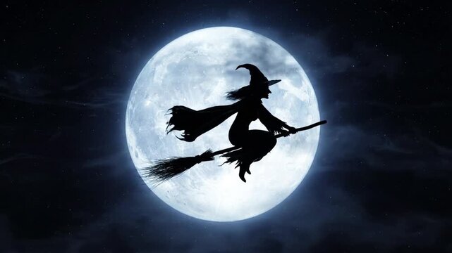 Silhouette of a witch flying on a broomstick against a large full moon in the night sky.