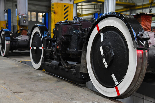 Tram wheel set in a repair workshop.