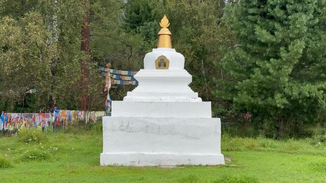 Video of Buddhist stupa or suburgan near the datsan Bodhidharma in the village of Arshan in the foothill valley of the Tunka Nature Park. Siberia, Baikal Region, Buryatia, Tunka Valley