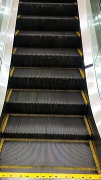 Moving Escalator Steps in Modern Building or Shopping Mall Close Up Video