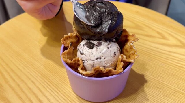 Close Up of Ice Cream Scoop in Bowl with Hand Holding Spoon ,Sweet Dessert