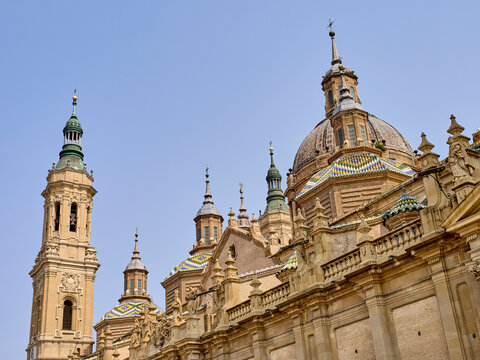 Tower of Saint James, Torre de Santiago in Spanish, and Dome of the Cathedral Basilica of Our Lady of the Pillar, Catedral Bas&iacute;lica de Nuestra Se&ntilde;ora del Pilar in Spanish. Zaragoza, Aragon, Spain