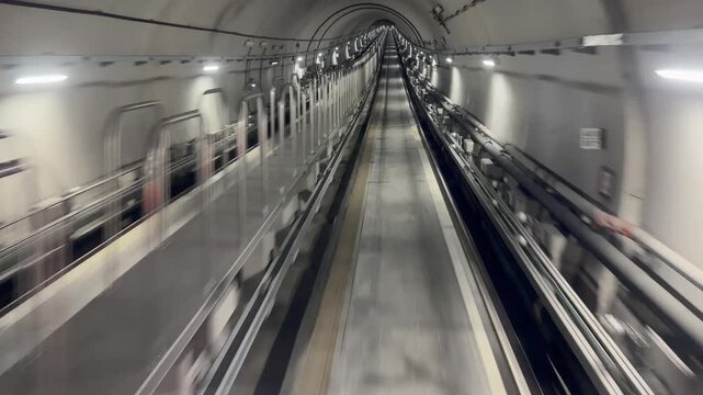 Driverless Train Ride Through Subway Tunnel &ndash; Front View During Fast Travel