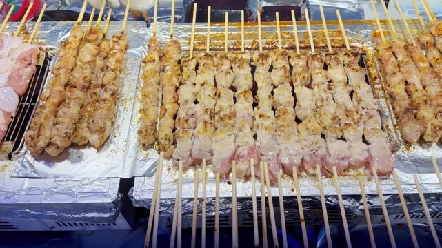 Grilled Meat Skewers on Korean Street Food Griddle &ndash; Hot Chicken Sticks