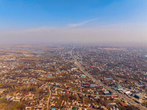 Aerial View of a Suburban Town with a Highway in Kyrgyzstan