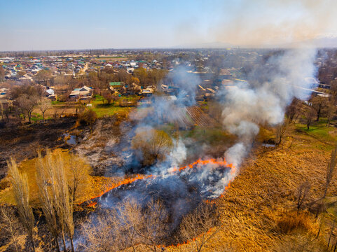 Aerial View of Wildfire Near Rural Village in Kyrgyzstan