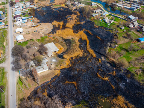 Aerial View of Burned Vegetation and Rural Settlement