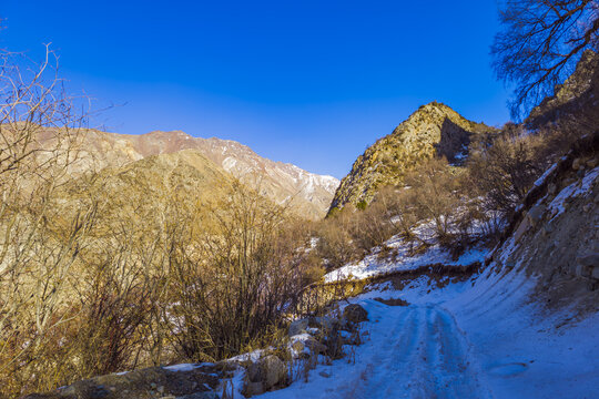 Snow-Covered Mountain Road in Kyrgyzstan