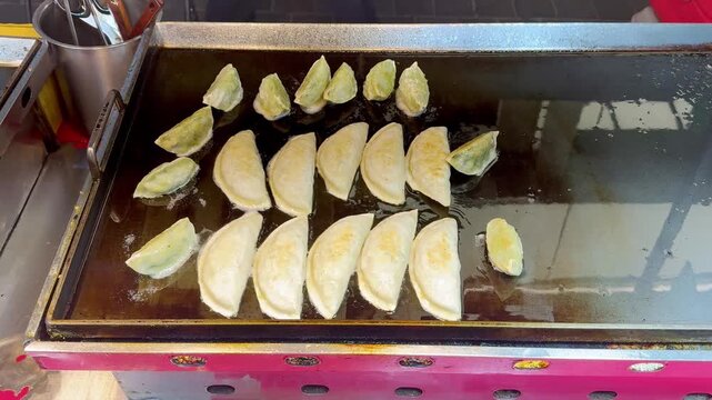 Fried Dim Sum at Korean Night Market &ndash; Crispy Dumplings on Hot Pan