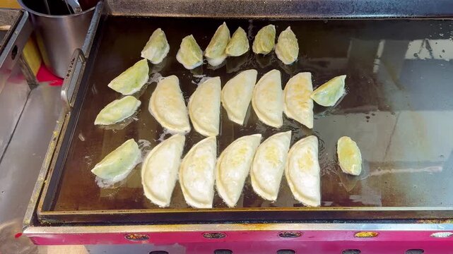 Fried Dim Sum at Korean Night Market &ndash; Crispy Dumplings on Hot Pan