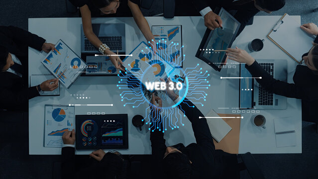 Business Meeting on Web 3.0 Concepts with Data Analysis and Digital Graphics at Modern Workplace Setting. Entropy.