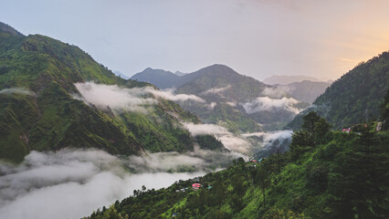 Fototapeta premium Cloudy mountains in Himachal Pradesh during monsoons