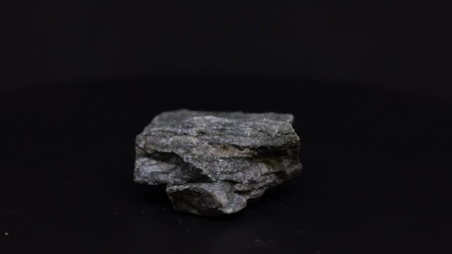phyllite mineral from Italy with black background