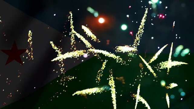 Bright colorful fireworks exploding in the night sky over the flag of djibouti