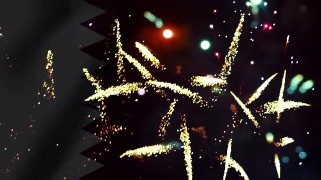 Bright colorful fireworks exploding in the night sky with national flag overlay of Qatar celebrating independence day