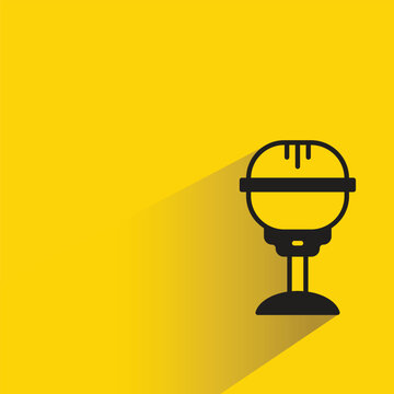 microphone icon with drop shadow on yellow background