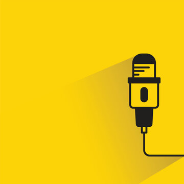 microphone icon with drop shadow on yellow background