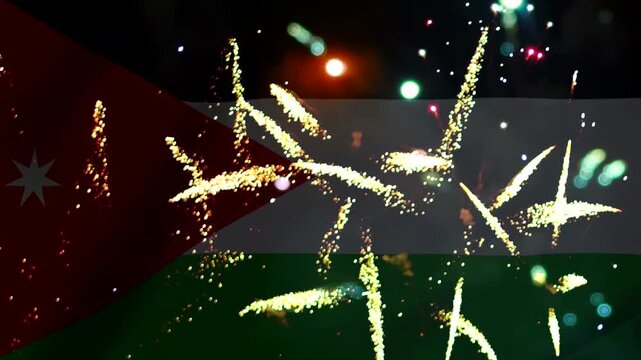 Bright golden fireworks exploding in the night sky over the national flag of Jordan during independence day celebrations