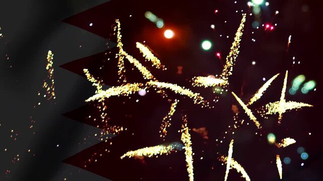 Bright golden fireworks exploding over the national flag of bahrain during a national celebration