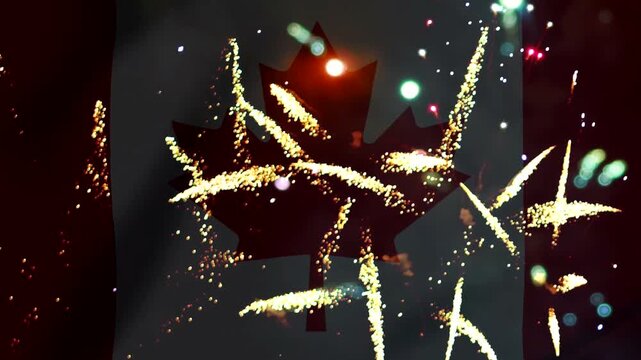 Bright golden fireworks exploding over the silhouette of the Canadian national maple leaf flag emblem