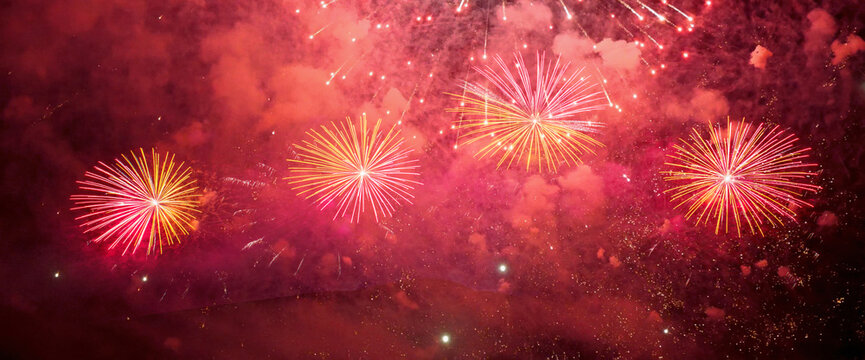 Red Firework celebrate anniversary in night time celebrate national holiday. Happy new year 2024, 4th of july holiday festival. Red firework Countdown to new year 2024 festival party time event