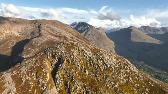 Aerial view of the Pap of Glencoe during sunset in the Scottish Highlands