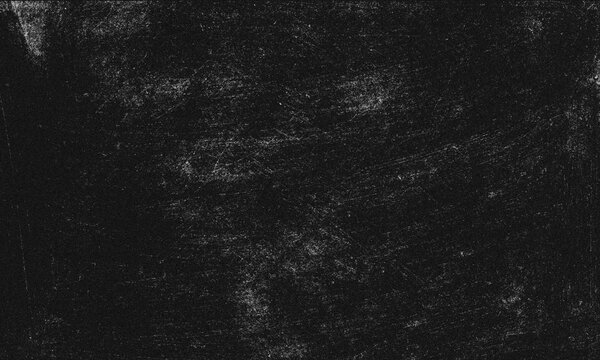 Close-up texture of dark rough cracked surface with deep shadows and grunge pattern