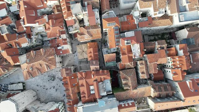 Top-Down Aerial View of Historic European Old Town With Red Tile Roofs