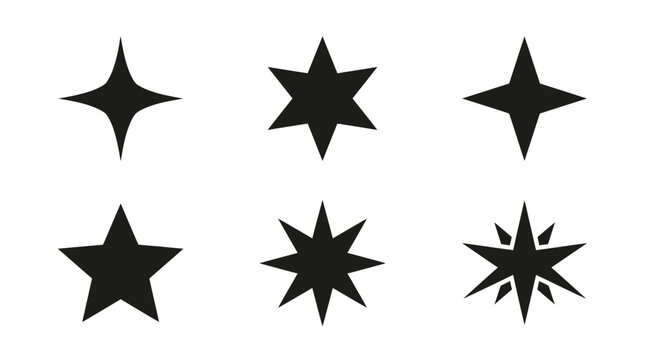 Six various black star icon designs including sparkling shapes and geometric star figures arranged neatly isolated on white background