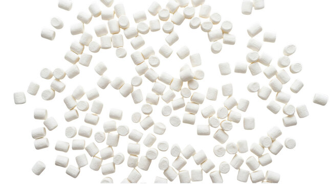 Small white marshmallows scattered on a flat surface