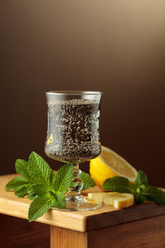 Diet vegan cocktail with chia seeds, lemon, and mint.