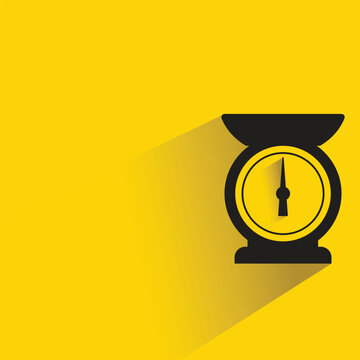 kitchen scale icon with shadow on yellow background