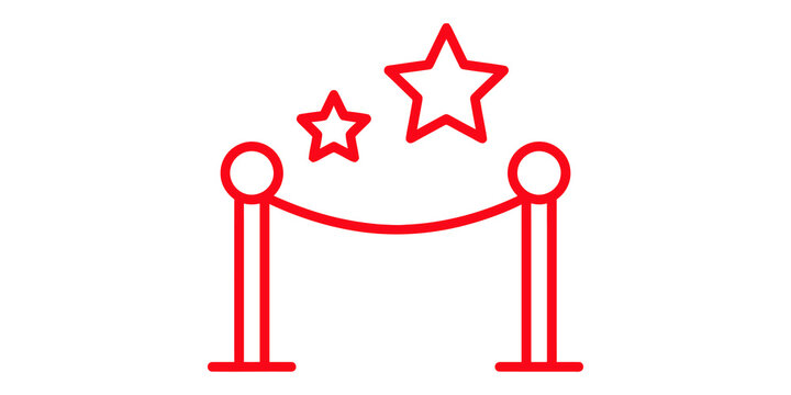Red carpet event with rope barrier and stars symbol in red.