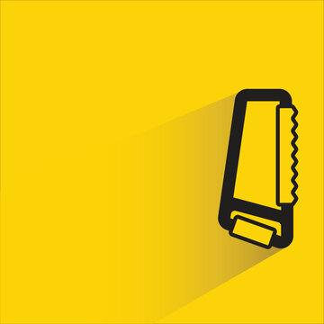 hand saw icon with shadow on yellow background