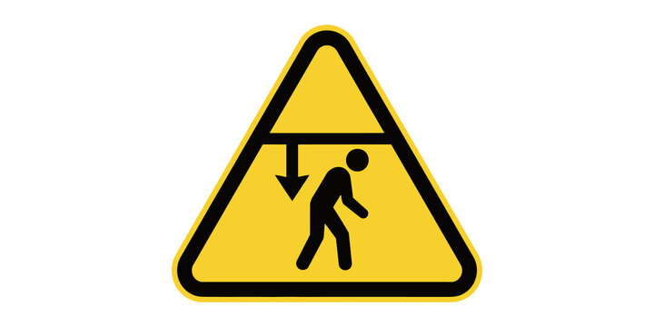 Low headroom warning triangle warns about overhead striking hazards.