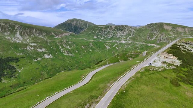 Drone View of Transalpina Road Through Romanian Mountains in Summer
