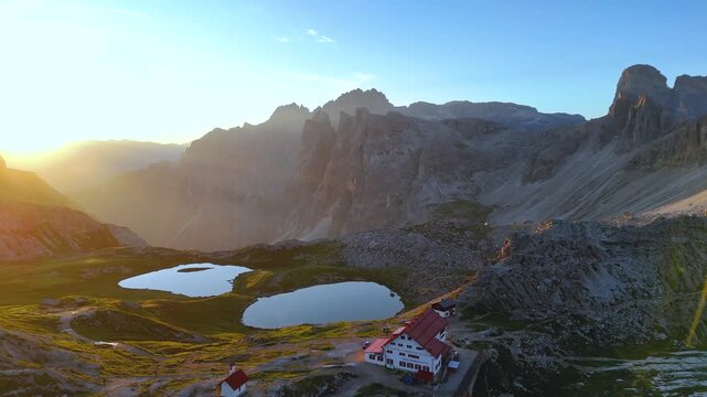 Forward Drone Flight Over Laghi dei Piani at Sunrise, Tre Cime
