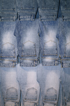Stacked Blue Denim Jeans in Retail Display