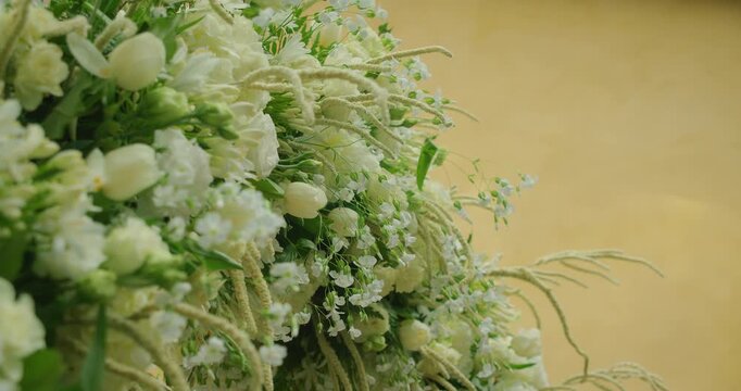 Elegant white floral arrangement for summer event