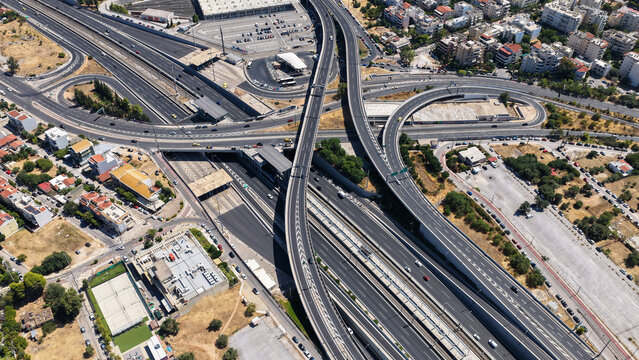 Aerial drone photo of popular multilevel highway junction overpass of Attiki Odos road, passing through Doukisis Plakentias Avenue with light traffic, Athens, Attica, Greece