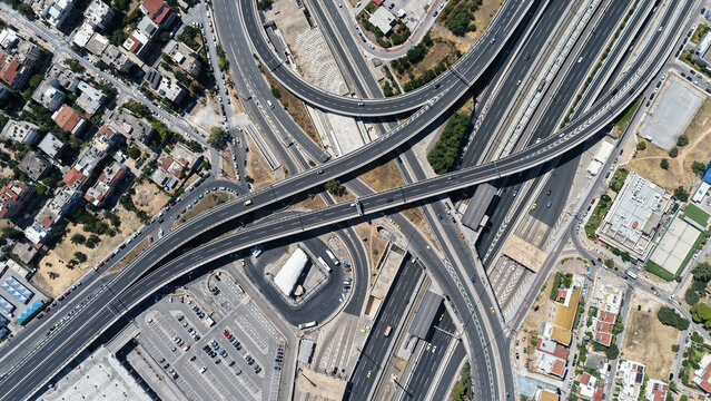 Aerial drone photo of popular multilevel highway junction overpass of Attiki Odos road, passing through Doukisis Plakentias Avenue with light traffic, Athens, Attica, Greece