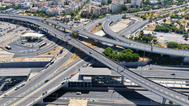Aerial drone photo of popular multilevel highway junction overpass of Attiki Odos road, passing through Doukisis Plakentias Avenue with light traffic, Athens, Attica, Greece