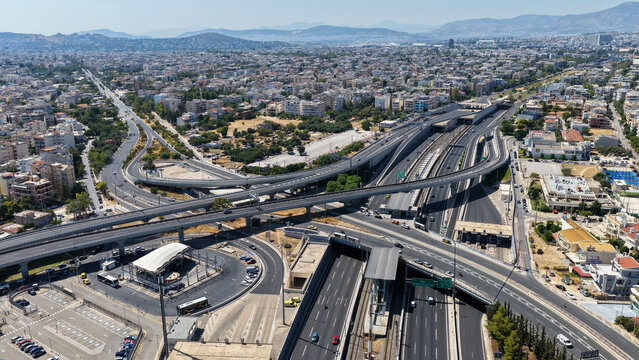 Aerial drone photo of popular multilevel highway junction overpass of Attiki Odos road, passing through Doukisis Plakentias Avenue with light traffic, Athens, Attica, Greece